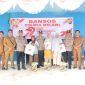 Polres Melawi bagikan 500 paket bansos untuk warga kurang mampu di Desa Tanjung Sari dalam rangka Hari Bhayangkara 