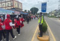 Satlantas Polres Melawi Turun Langsung Kawal Pawai HUT SMAN 1 Nanga Pinoh