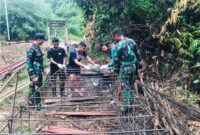 Kodim 1209/Bky percepat pembangunan Jembatan Gantung Perintis Garuda Tahap III di Bengkayang guna dukung ekonomi, pendidikan, dan akses warga.