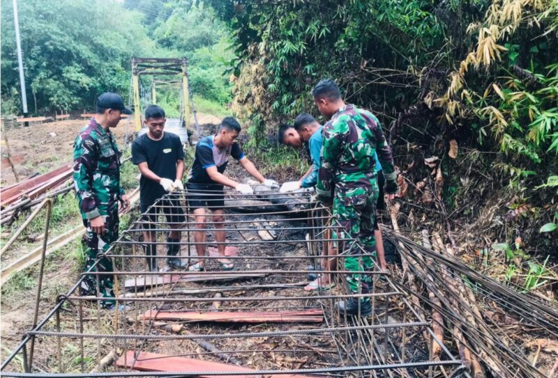 Kodim 1209/Bky percepat pembangunan Jembatan Gantung Perintis Garuda Tahap III di Bengkayang guna dukung ekonomi, pendidikan, dan akses warga.