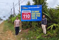 Baliho Layanan 110 Polri Hadir di Sungai Tebelian, Pemudik Kini Lebih Aman
