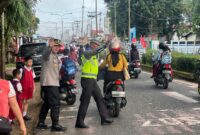 Kapolres Melawi AKBP Harris Batara Simbolon Pimpin Strong Point dan Pengaturan Lalu Lintas Pagi