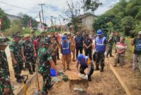 Polsek Menyuke Hadiri Peletakan Batu Pertama Jembatan Perintis Garuda di Desa Darit