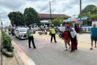 Satlantas Polres Melawi Atur Lalu Lintas di SMPN 1 dan Dua SD di Nanga Pinoh