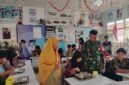 Kawal Pendistribusian Makan Bergizi Gratis, Babinsa Roban Hadir di Tengah Pelajar