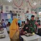 Kawal Pendistribusian Makan Bergizi Gratis, Babinsa Roban Hadir di Tengah Pelajar