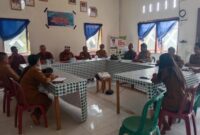 Bhabinkamtibmas Polsek Menyuke Hadiri Musyawarah Desa Penetapan Anggaran Pendapatan dan Belanja Desa Tolok